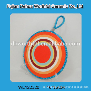 Colorful design ceramic hot pot mat with blue rope